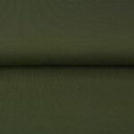 Olive green cotton fabric close-up texture