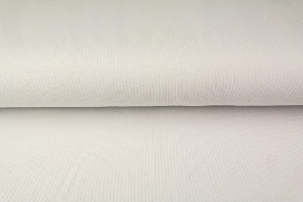 Vaalea kangasrulla tekstiileihin ja sisustukseen