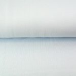Folded light blue cotton fabric material