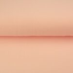 Peach pink cotton fabric material roll