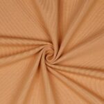 Beige puuvillakangas rypytettynä keskeltä