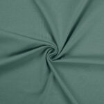 Green fabric with twisted centre fold pattern