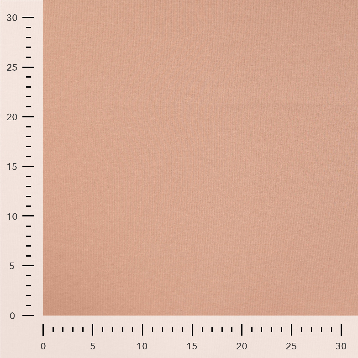 Beige fabric sample with measurement scale.
