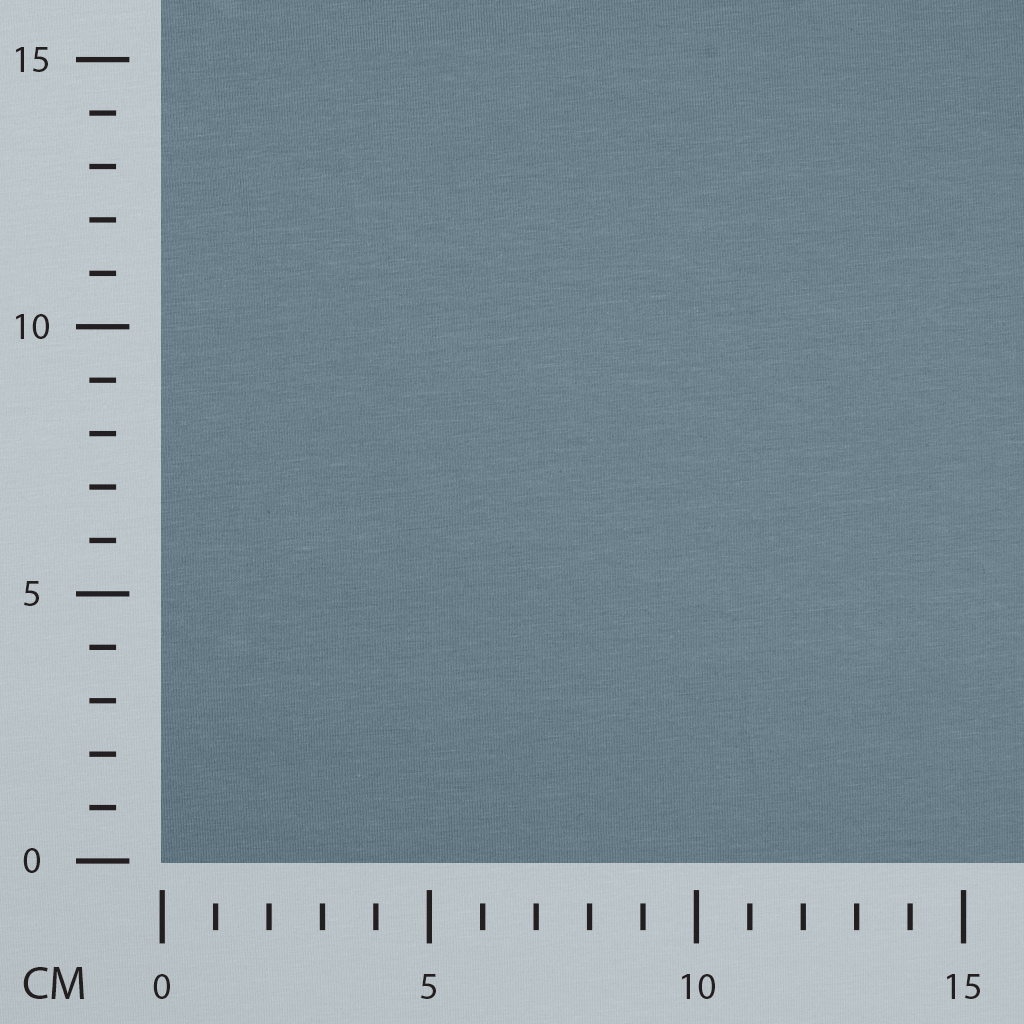 Blue fabric sample with measurement scale