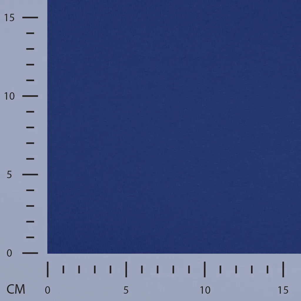 Dark blue fabric sample with measurement scale