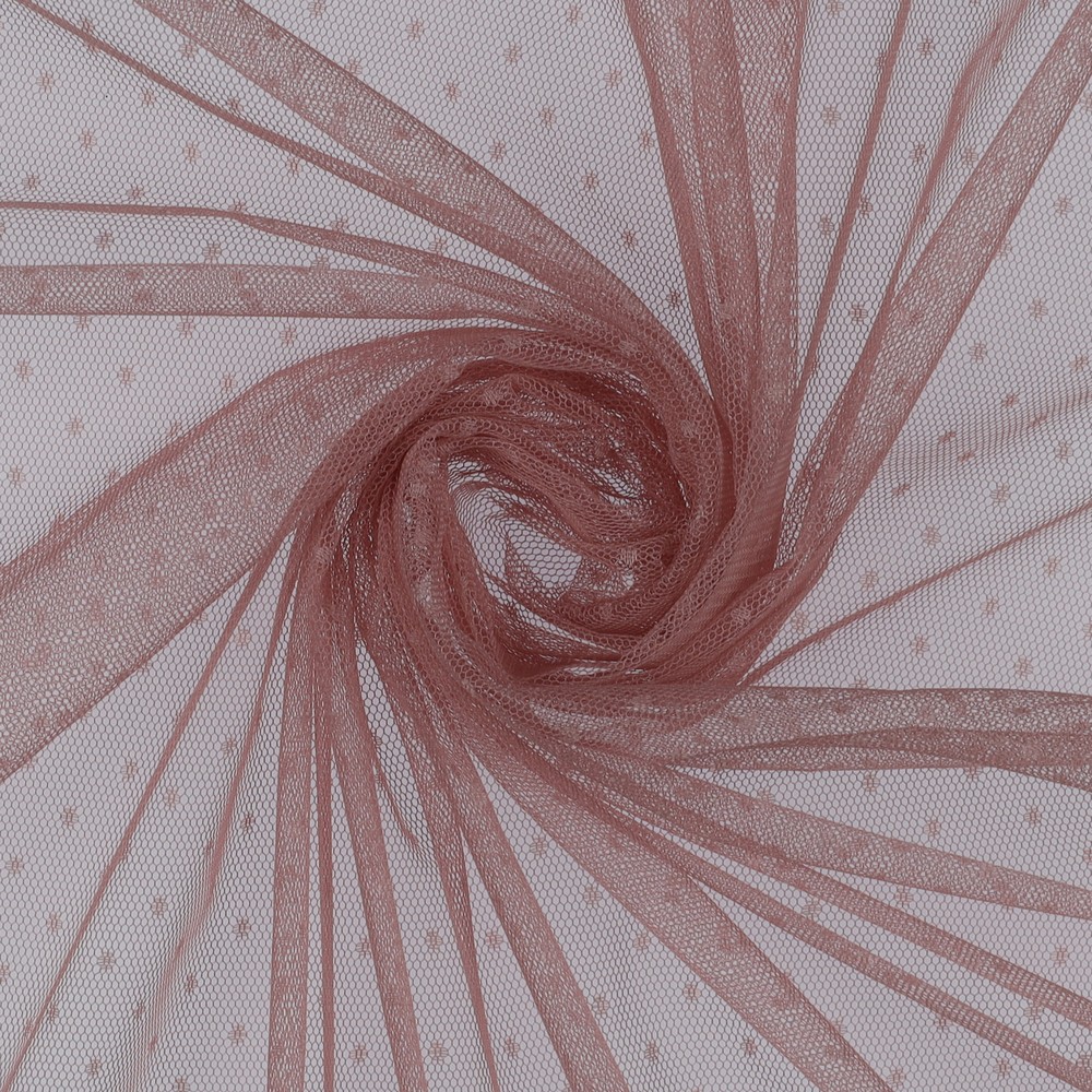 Roosa täpiline tüllkangas keeratud mustriks