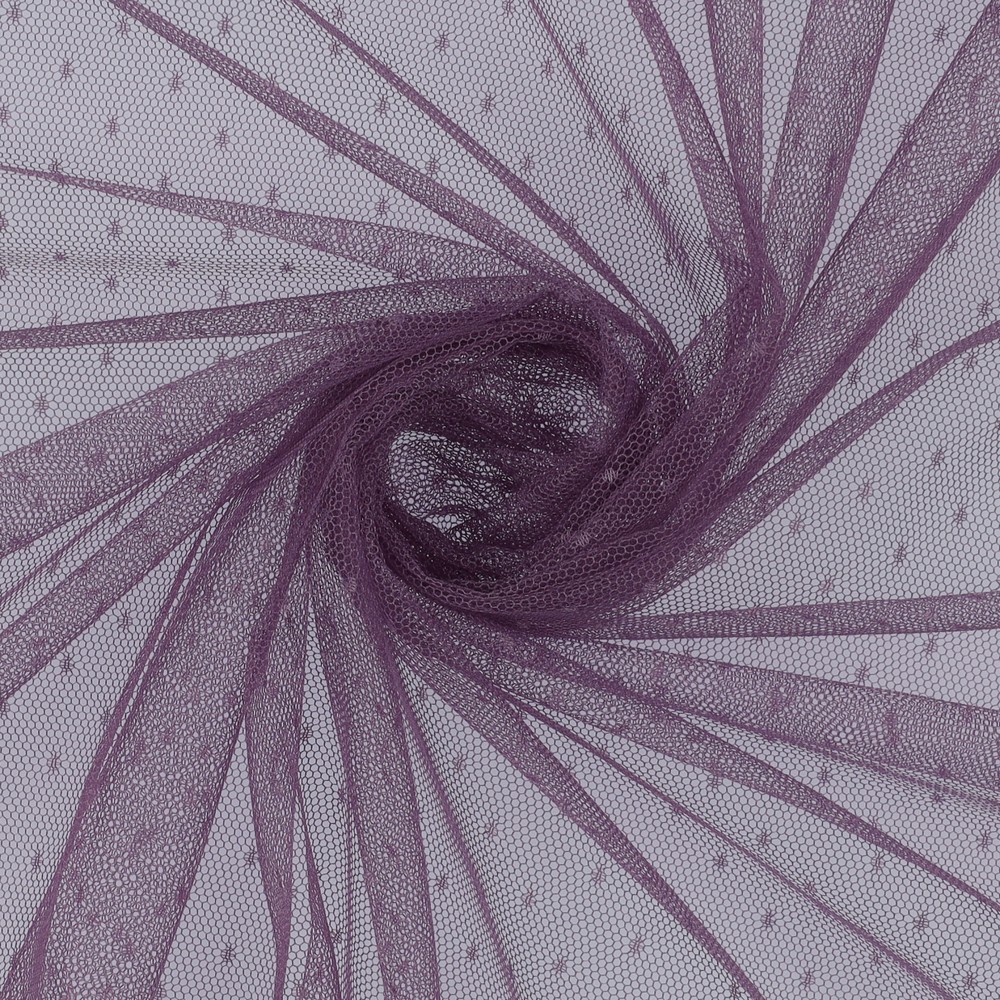 Lilla täpiline tüllkangas keeratud voltides