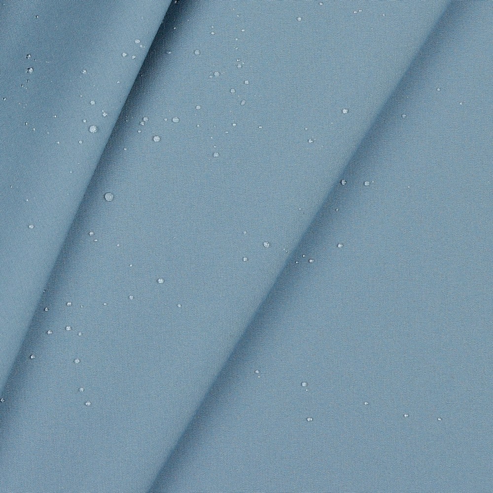 Veekindel sinine kangas veepiiskadega