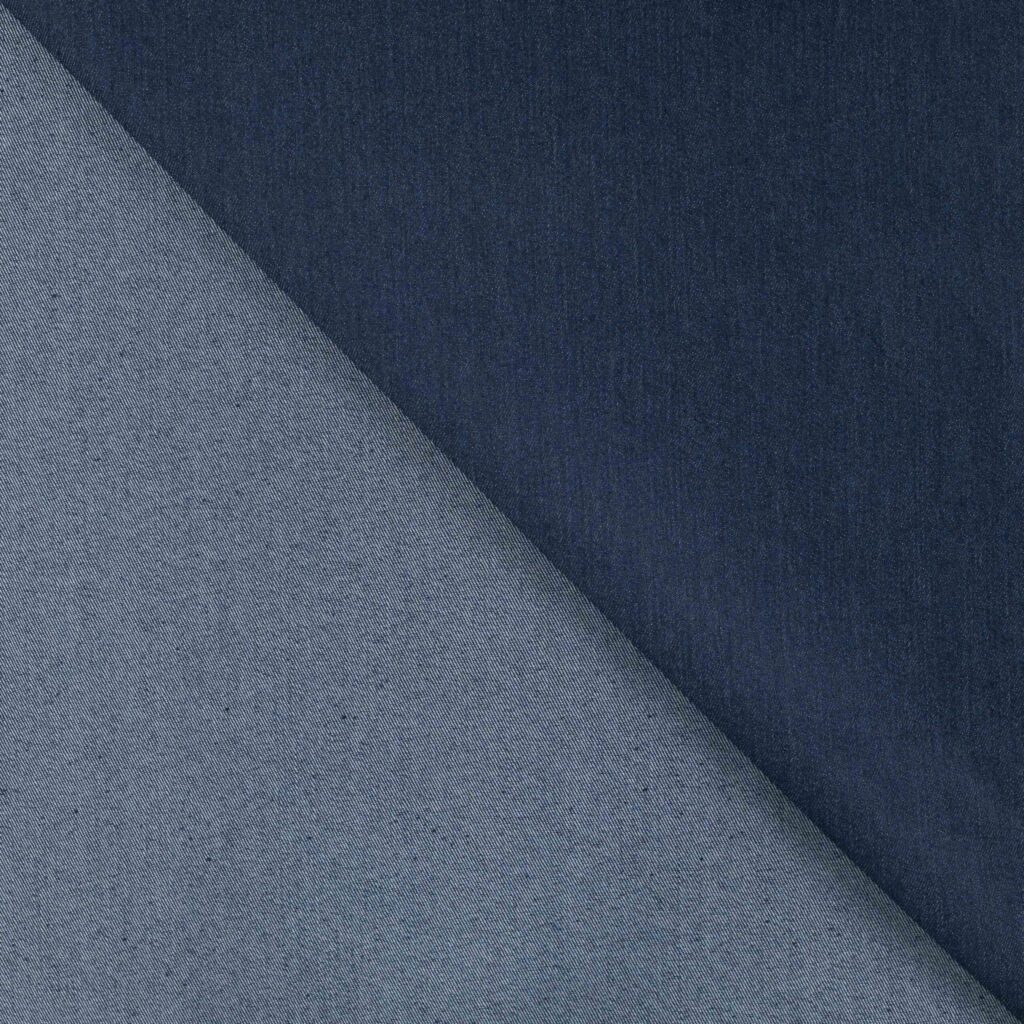 Tumesinine ja helehall denimmaterjal diagonaalses mustris