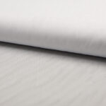 Valge kangas rullina õmblemiseks ja käsitööks