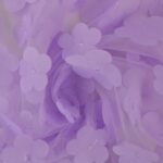 Lillornamentidega lillakas tüllkangas