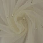 Hele tüllkangas pärlite ja sädelustega