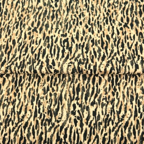 Leopardi mustriga kangas pruunil taustal