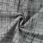 Hall kangas musta ruudulise mustriga