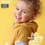 Laps kollases pusa naeratab Ottobre ajakirja kaanel