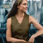 Naine pruunis kleidis ajakirja kaanel.