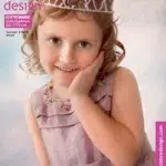 Tüdruk roosas kleidis Ottobre ajakirja kaanel