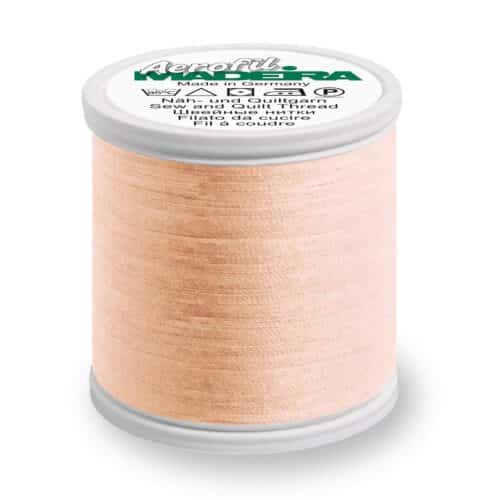 Beige õmblusniit rullil