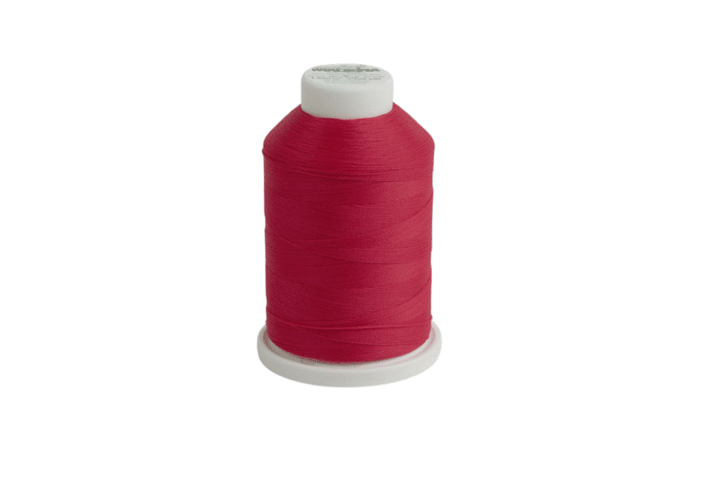 Punane õmblusniit plastpoolil