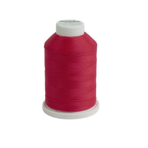 Punane õmblusniit plastpoolil