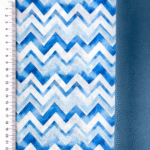 Sinivalge siksakiline kangamuster mõõdulindiga.