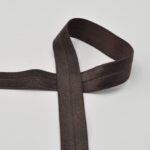 Tumepruun elastne kallutuslint õmblustöödeks