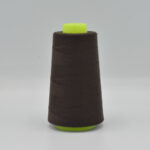 Pruun õmblusniit koonusel roheline otsaga