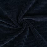 Tume sametine soonikkoes kangas lähedalt vaadatuna