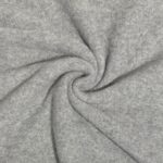 Hall villane kangas keeratud voldiks