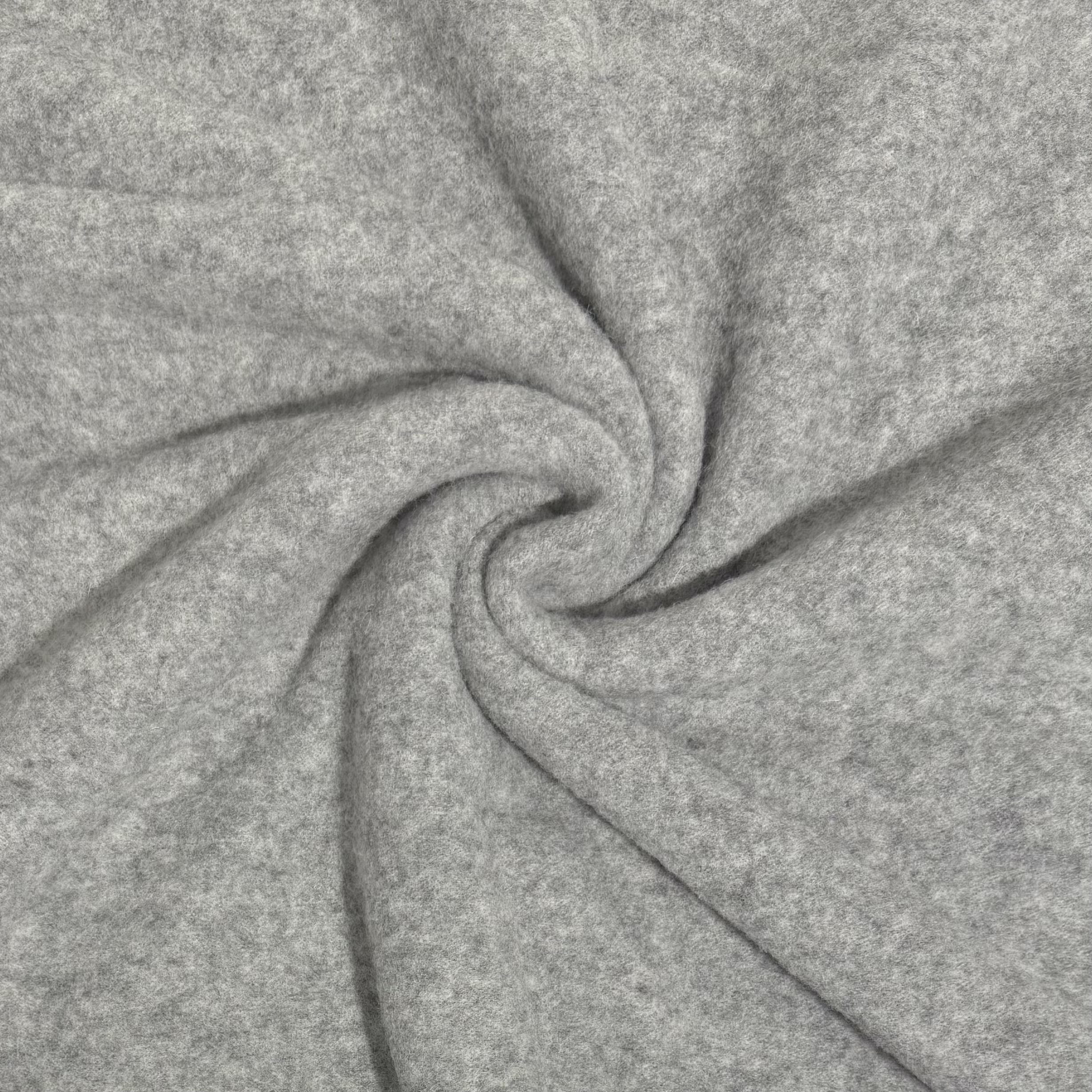 Hall villane kangas keeratud voldiks