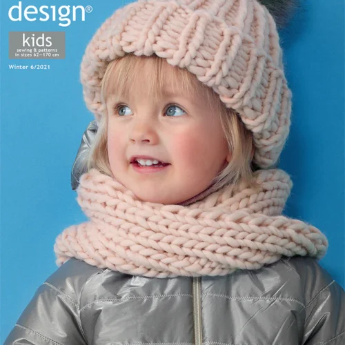 Laps talverõivastes Ottobre ajakirja kaanel