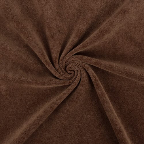 Pruun pehmea kangas keeratud voldiks