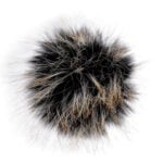 Musta ja pruuni karvaga karvane tutt