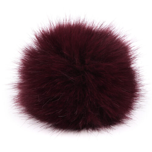 Tumepunane karvane pompon