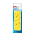 Kollased plastist nööpnupud õmblustöödeks