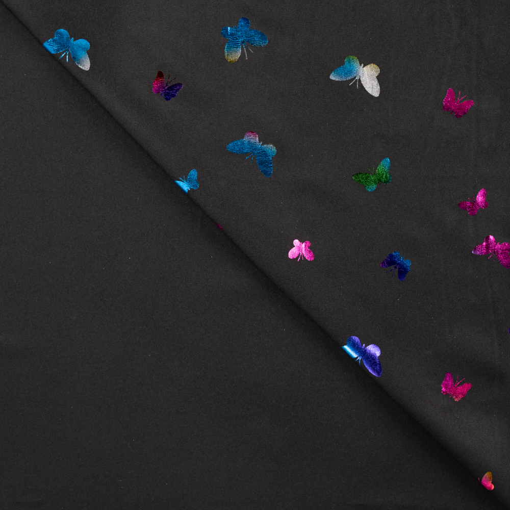 Must kangas värviliste liblikatega muster