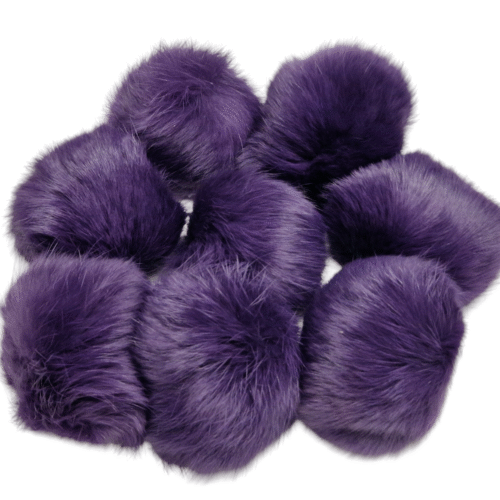 Lilla karvane pompomide kogum