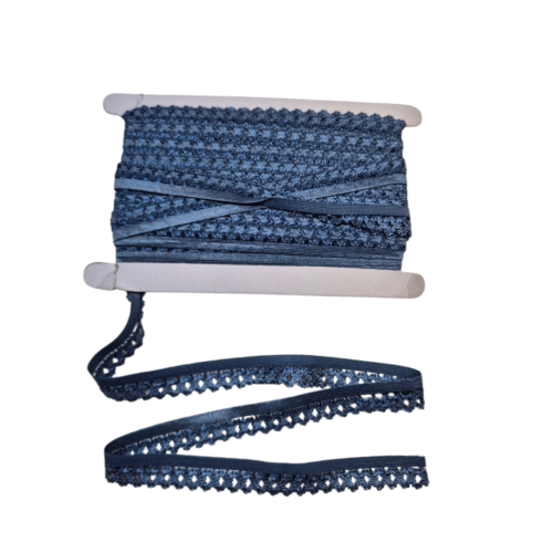 Tumesinine pitsilise servaga elastne lint rullil