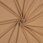 Beež kortsutatud kangas taustana