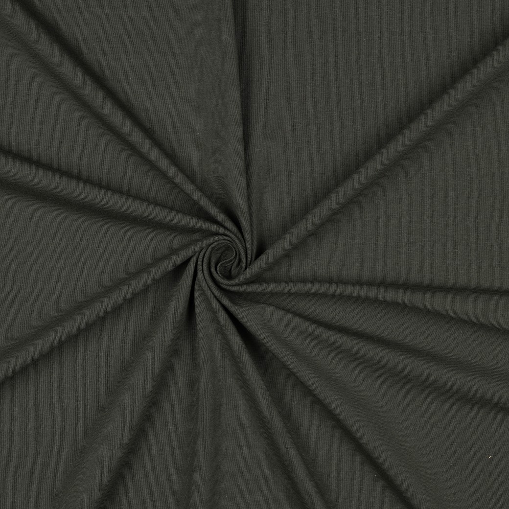 Tumehall veniv kangas keeratud voltides