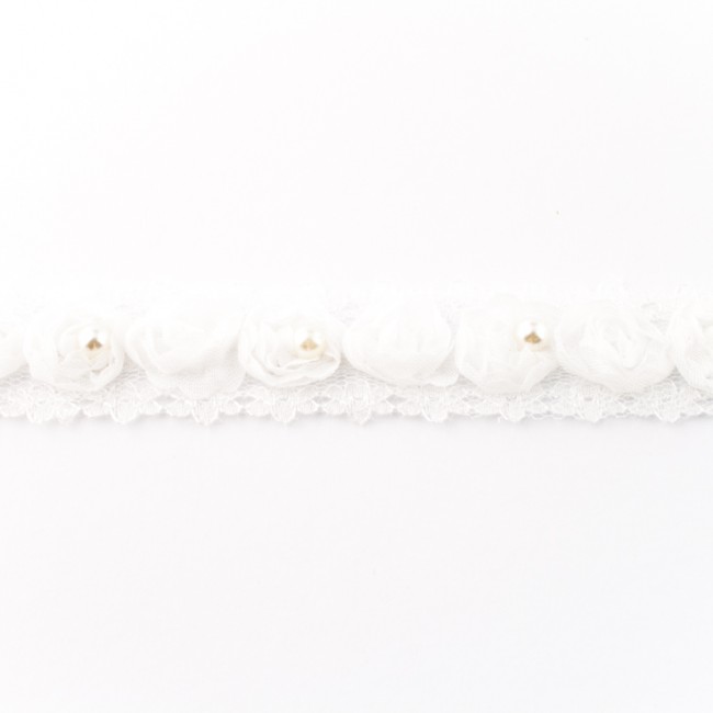 Valge pitsist lint roosidega