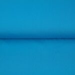 Helesinine puuvillane kangas rullis