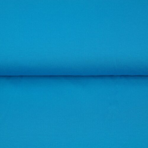 Helesinine puuvillane kangas rullis