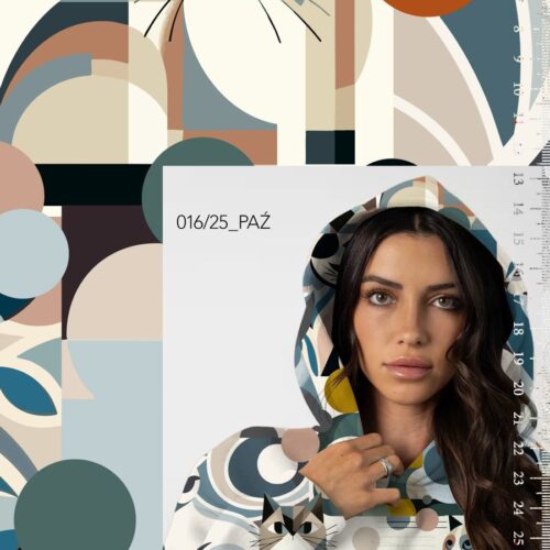 Naine geomeetrilise kassimustriga pusa seljas