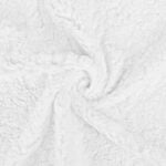 Valge pehme fliisist kangas keeratud mustrisse