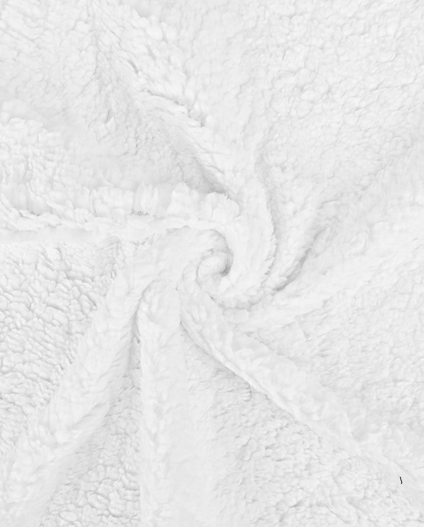 Valge pehme fliisist kangas keeratud mustrisse