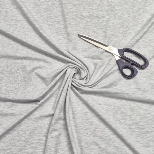 Gray fabric swirl with scissors on top