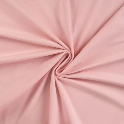 Soft pink fabric twisted into spiral pattern