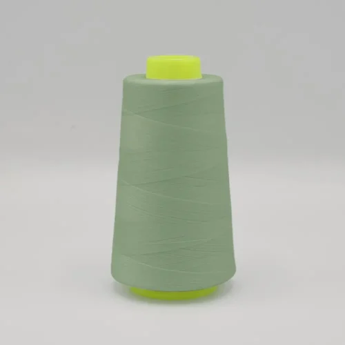 Light green thread cone on white background