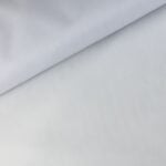 Valge rullitud kangas lähivaates